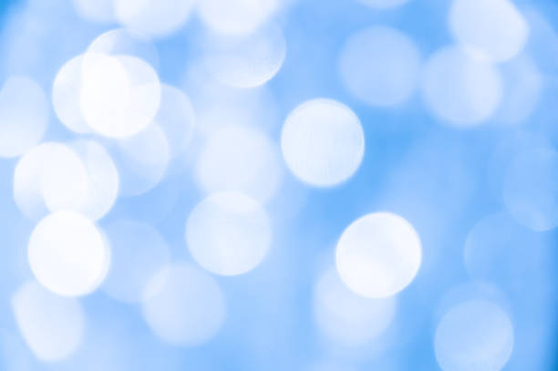 istock Defocused abstract blue-white christmas background. Christmas bokeh. Sky bokeh 1291193792
