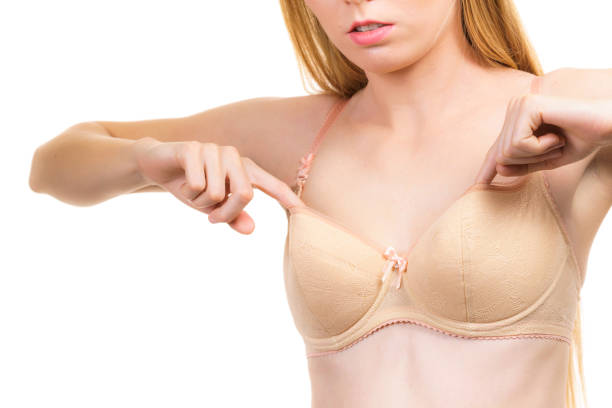 istock Woman wearing wrong size bra 1291194535