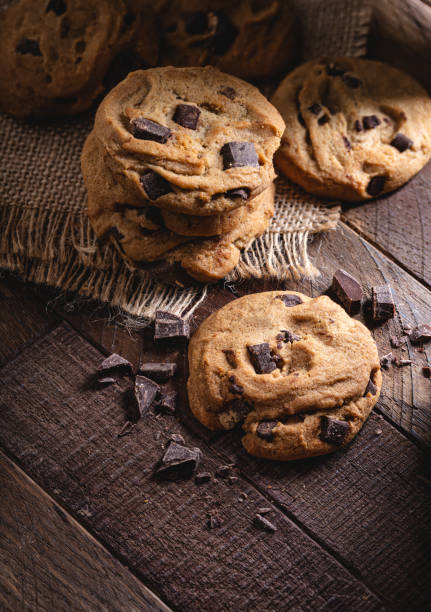 istock Chocolate Chip Cookies on a Wooden Table 1291195056
