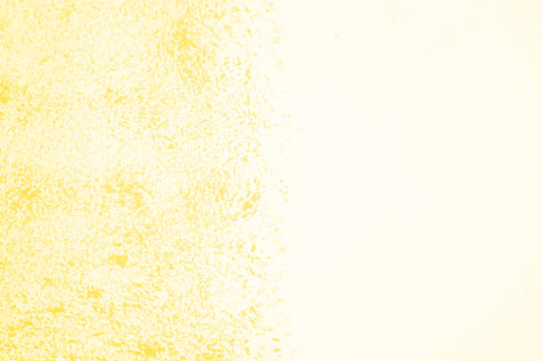 istock White wall painted in trend yellow 2021. Background with copy space to write descriptive text 1291198099