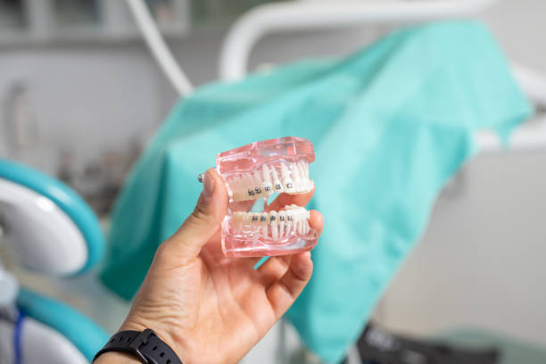 istock Dentist is working on facial dental prosthetic 1291200397