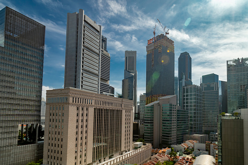 Scenic view of skyscrapers and Anderson Bridge in Marina Bay in Singapore. Beautiful summer cityscape. Singapore skyline. Singapore is a popular tourist destination of Asia