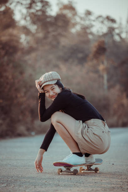 istock Girl and Skateboard. 1291204662