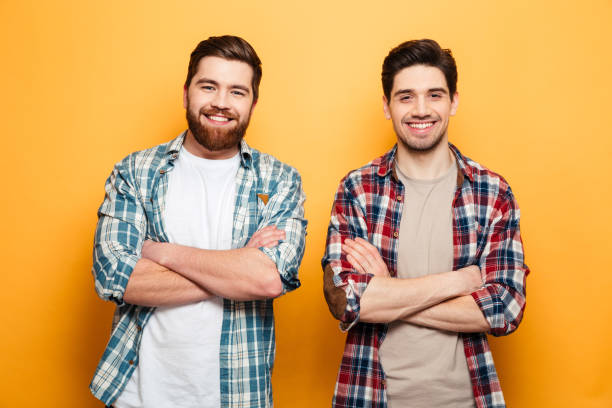 istock Portrait of a two smiling young men 1291204936