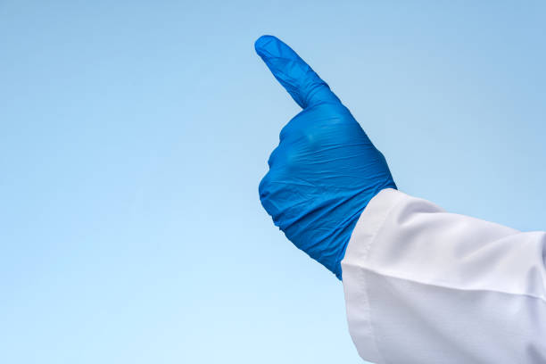doctor hand touching schermo virtuale - glove surgical glove human hand protective glove foto e immagini stock