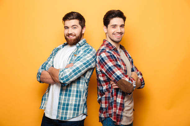 istock Portrait of a two smiling young men 1291207988