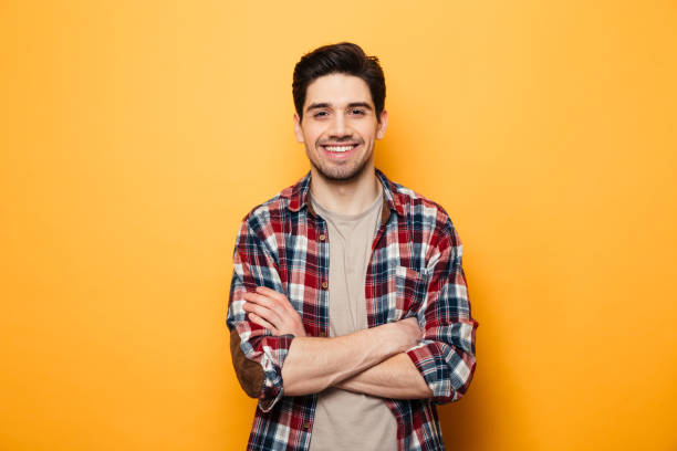 istock Portrait of a smiling young man standing 1291208657
