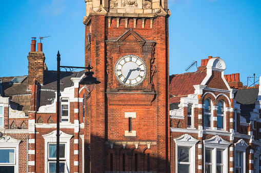 Closeup of the clock tower in Crouch End, North London