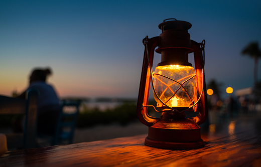 Antique lantern on a table outdoor restaurant