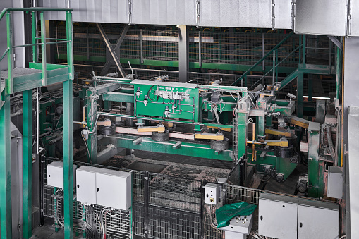 interior of an automated workshop for the production of boards at a modern sawmill