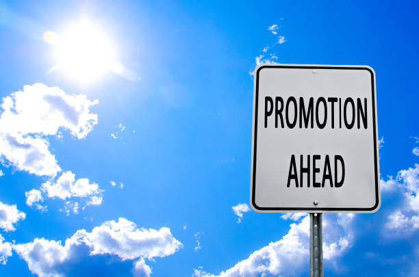 istock Road sign with message of Promotion ahead 1291229492