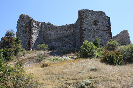 Novo Brdo, Kosovo - August 21, 2011: The ruins of the medieval Serbian Novo Brdo Fortress. The fortress was built in the late 13th century to protect gold, silver, iron and lead mines in the area.