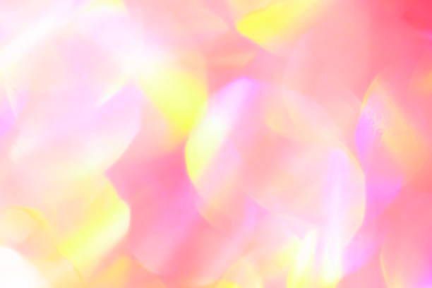 istock Beautiful coral yellow and pink defocused bokeh lights 1291236071