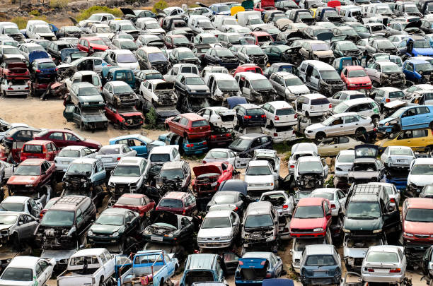 istock Old Junk Cars On Junkyard 1291236889