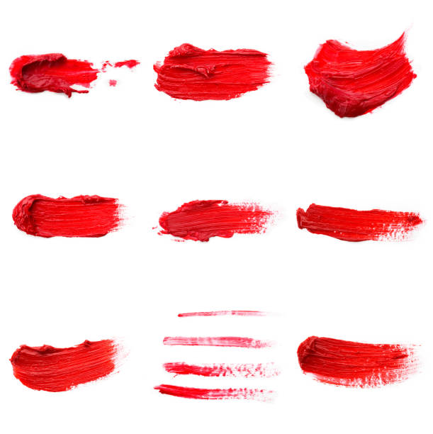 istock Lipstick smear smudge swatch isolated on white background. Cream makeup texture. Bright red color cosmetic product brush stroke swipe sample 1291237045