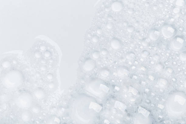 istock Foam bubble from soap or shampoo for washing isolated on white background from above 1291237680