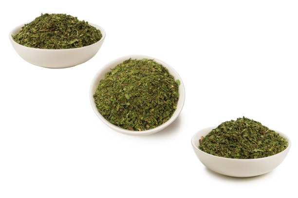 istock Dry mint in a bowl isolated. 1291238433