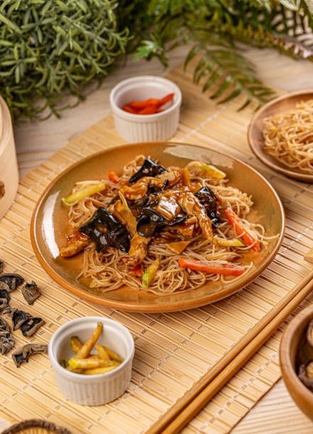Chow mein menu Chow mein menu, stir-fried noodles with vegetables, chicken stripes and jelly ear auriculariales photos stock pictures, royalty-free photos & images