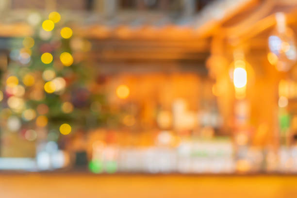 xmas showcase. wreaths, snowmen, Christmas trees and Christmas lights on city street. blurred background due to the concept. empty space for your text