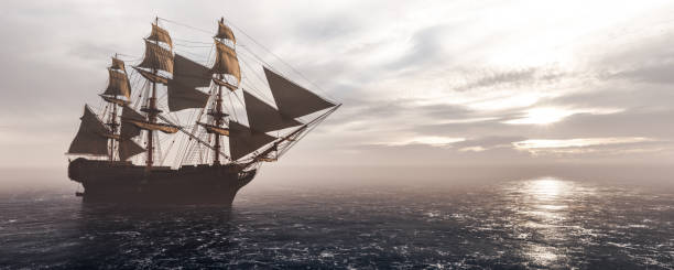 istock Pirate ship sailing on the ocean. Stormy clouds 1291240522