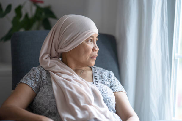 istock Asian female cancer patient  looking sad 1291242163
