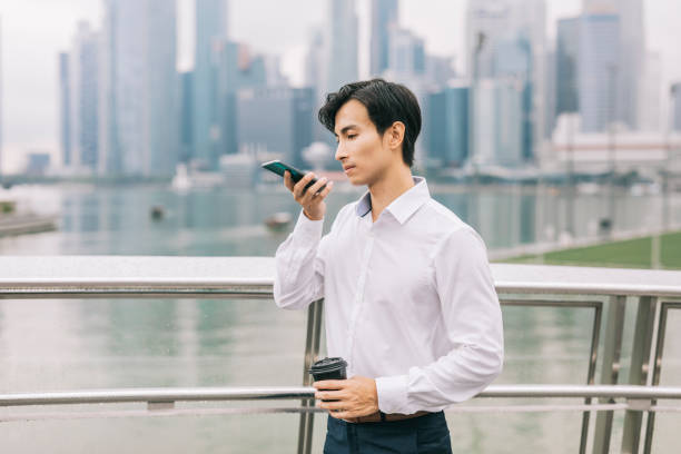 istock Businessman talking with smartphone 1291242416