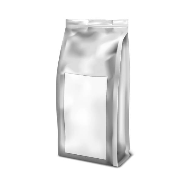istock Foil gusseted bag with blank label sticker isolated on white background, realistic vector mockup. Vacuum stand up pouch, mock-up for design 1291243766