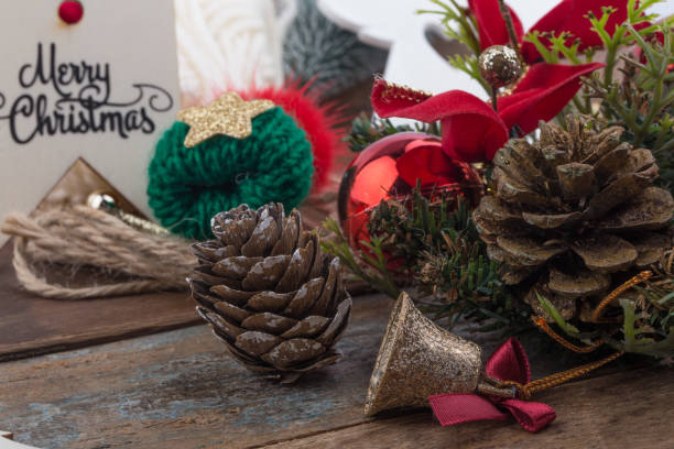 istock Christmas ornaments and decorations on wooden background. 1291243945