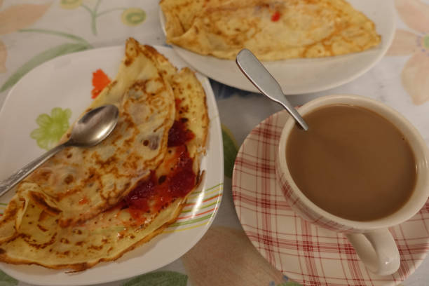 istock Sweet crepe  Strawberry jam  Coffee with milk 1291244737