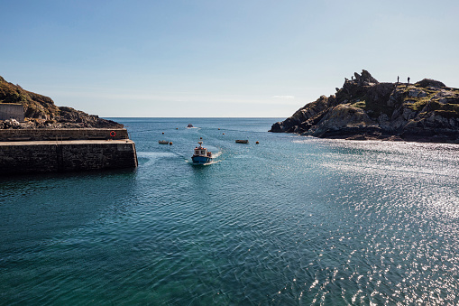 High stone embankment and beach at low tide, in beautiful Saint-Malo, Brittany, France