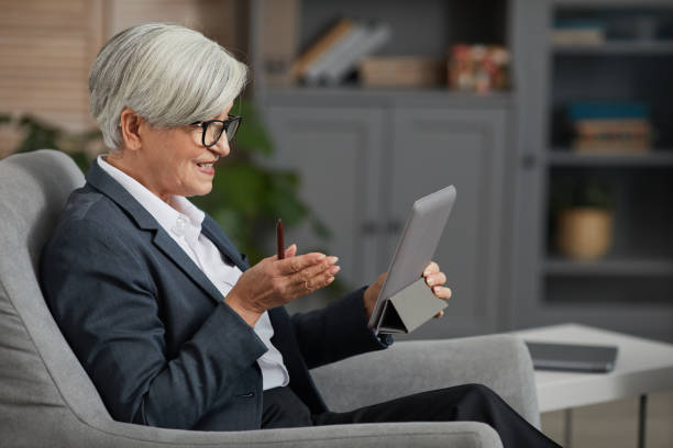istock Businesswoman talking online 1291254423
