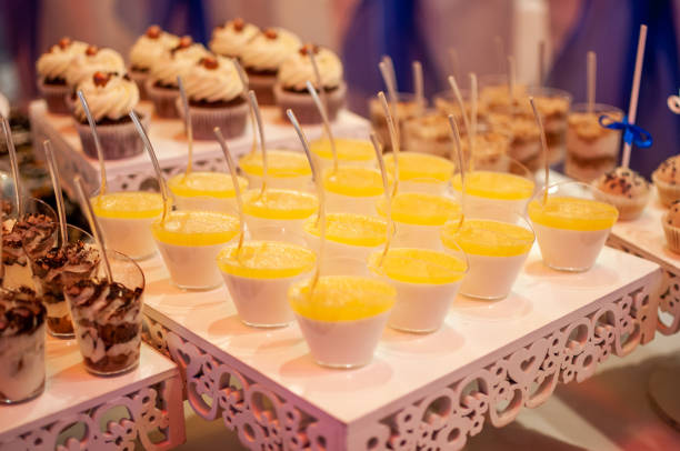 istock Sweet cakes in cups at a wedding buffet. Candy bar catering 1291259307