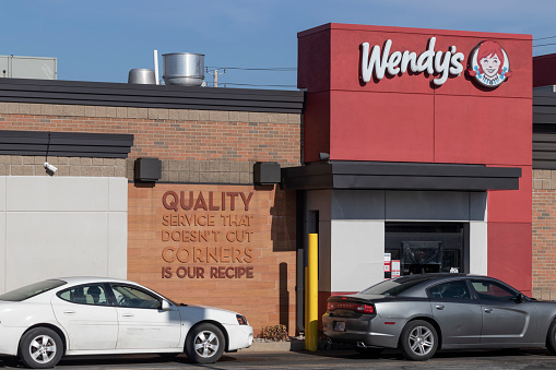 Indianapolis - Circa December 2020: Wendy's Retail Location. Wendy's is an International Fast Food Restaurant Chain.
