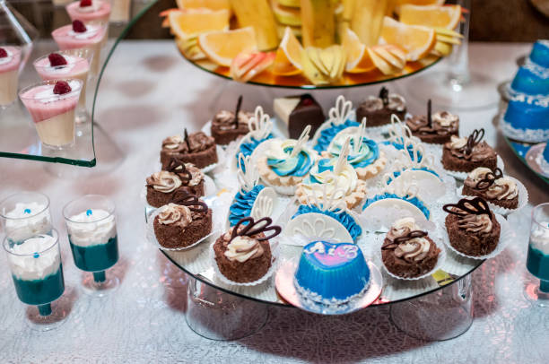 istock Candy bar with sweet cakes at a wedding 1291259778