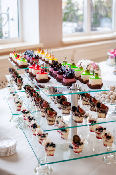 istock Sweet cakes at a wedding buffet. Catering 1291259968