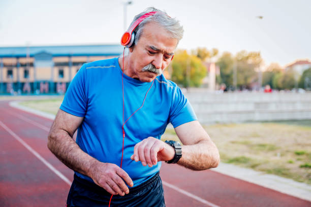 istock Active senior man looking at his smartwatch 1291260815