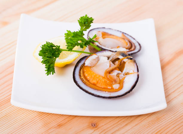 istock Fresh bivalve mussels with lemon 1291260899