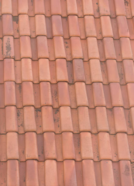 istock Old roof with dirt tiles. Texture backdrop 1291262403