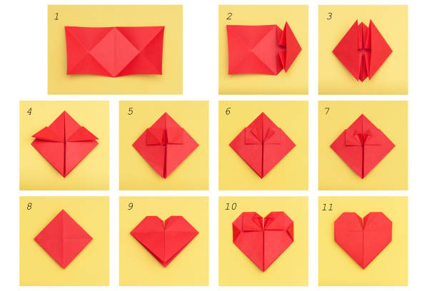 istock Step by step instruction how to make paper heart. DIY concept. 1291264644