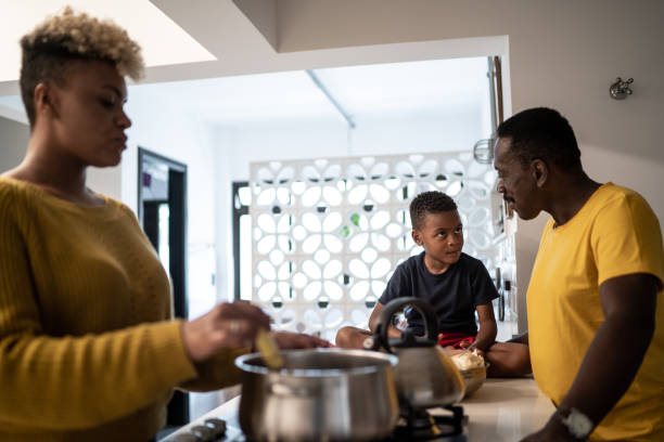 istock Family together in the kitchen 1291265444