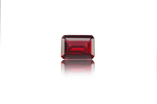 istock macro mineral stone cut Rhodolite on a white background 1291267371