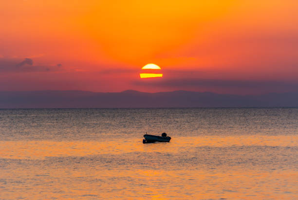 Sunset on Kassandra peninsula, Chalkidiki, Greece Sunset on Kassandra peninsula, Chalkidiki, Greece paralia stock pictures, royalty-free photos & images