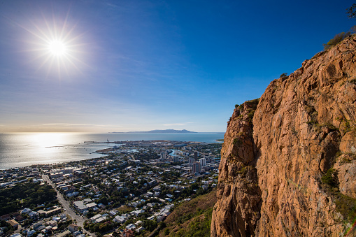 Townsville, Australia - July 10, 2018: Early morning looking out over the Far North Queensland city of Townsville and Magnetic Island from the top of Castle Hill.