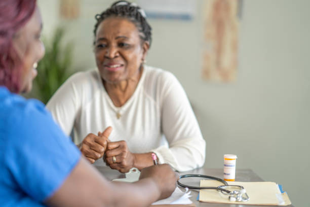 istock Senior woman visiting the doctor 1291274581