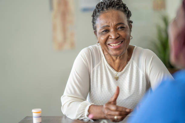 istock Senior woman visiting the doctor 1291274584