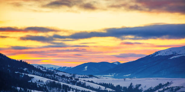istock winter landscape in mountains at sunrise 1291276504