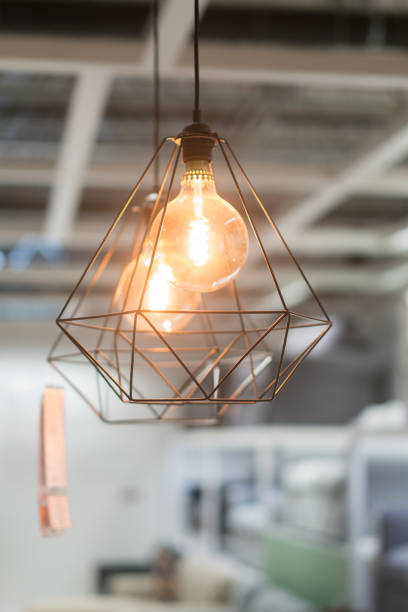 istock Glowing light bulbs in the loft style. 1291278867