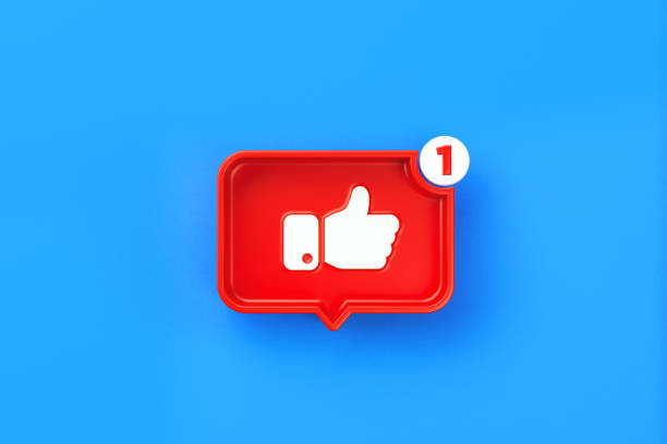istock Red Chat Bubble With Thumbs Up - Like Symbol On Blue Background 1291280292