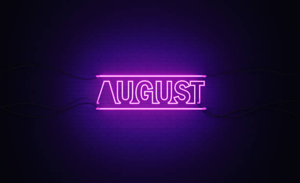 istock Purple Neon Light Writes August on Black Bricked Wall 1291282253