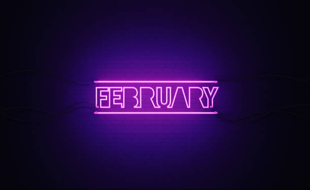 istock Purple Neon Light Writes February on Black Bricked Wall 1291282300